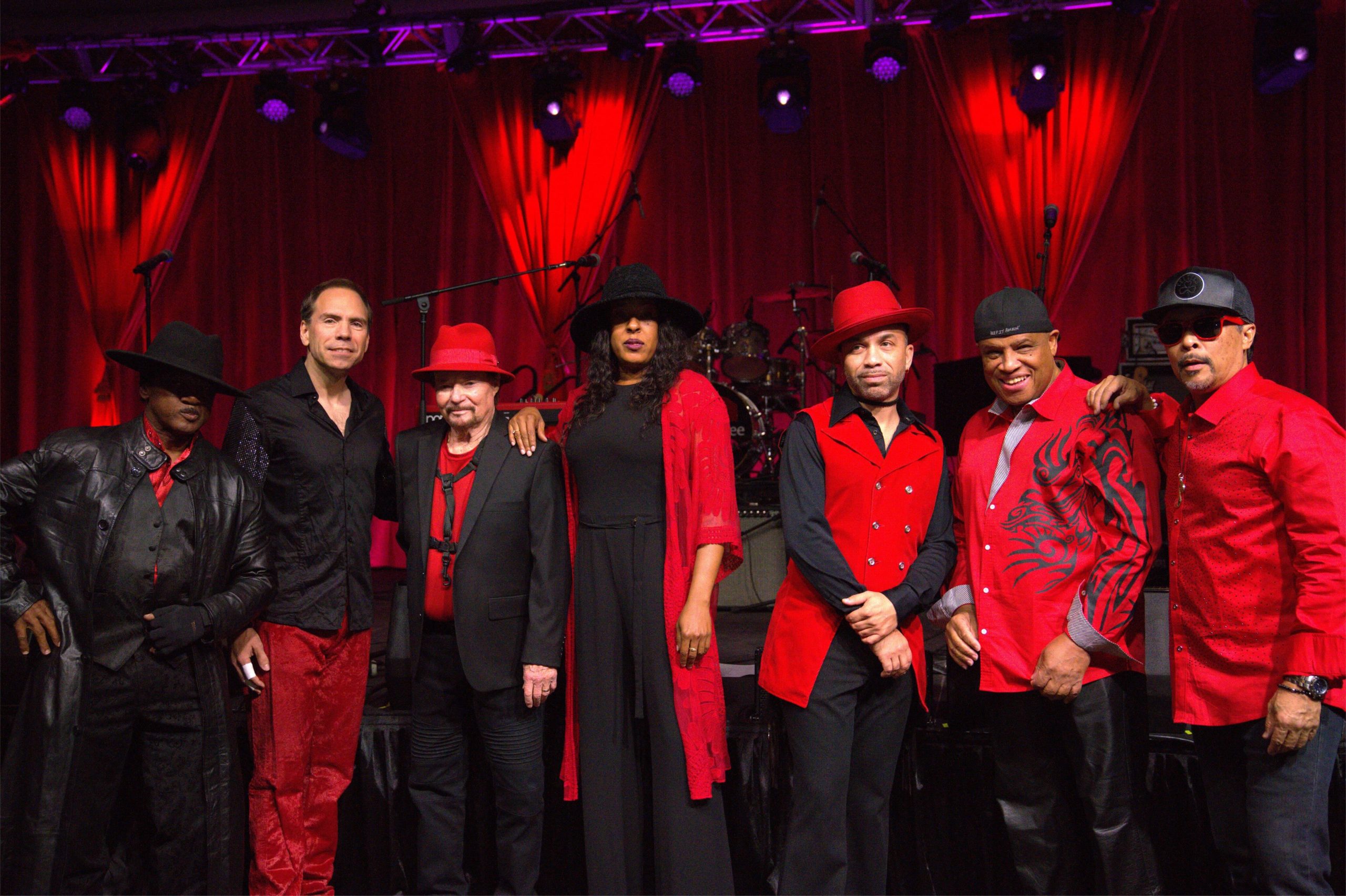 The Family Stone is the only band officially authorized by the legendary Sly Stone to carry on the legacy of his iconic music. Led by Rock n' Roll Hall of Fame inductee and founding member Jerry Martini, The Family Stone keeps the music of Sly and the Family Stone alive on stages around the world. Formed in San Francisco (1966), Sly and the Family Stone made history as America's first major multi-racial, multi-gender touring band. Their infectious blend of funk, soul, R&B, rock, and psychedelia propelled them to global fame. Fronted by the visionary Sly Stone, the band's original lineup included his brother Freddie Stone (guitar), sister Rose Stone (keyboards), Jerry Martini (saxophone), Larry Graham (bass), Greg Errico (drums), and the late, great Cynthia Robinson (trumpet). Affectionately known as "Papa J," Jerry Martini helped shape the band's revolutionary sound. "Sly and I formed a lifelong bond when I nudged him into leading the band in 1965," says Martini. "Our influence helped shift the landscape of popular music in ways that still resonate today." Carrying the torch forward is powerhouse vocalist Phunne Stone— daughter of Cynthia Robinson and Sly Stone. Her electrifying performances honor her parents' legacies while forging a bold path of her own. Sly is proud to witness her vocal prowess in performing his music on stage. Today, The Family Stone remains true to its original mission: to uplift and unite. Still multi-racial and multi-gender, the band continues to inspire audiences of all ages to STAND for peace, equality, and everyday people.